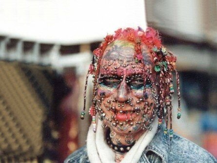 Dramatic Face Piercings and Tattoos