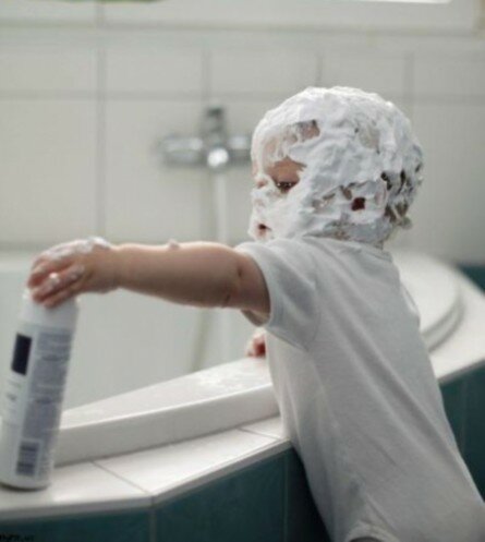 Funny baby with shaving foam