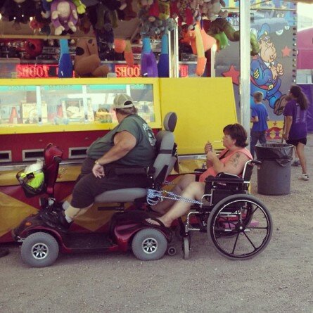 Simply Demotivational Fat people riding electric wheelchairs