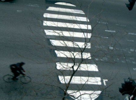 Foot shaped pedestrian crossing